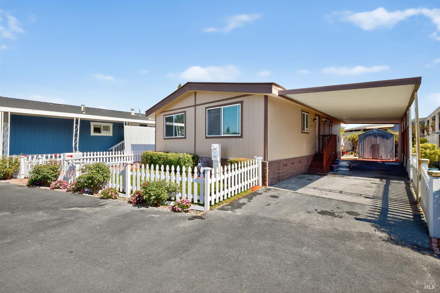 109 Pear Lane, Unit 109 Santa Rosa, CA 95407 - Photo 24 of 27 a front view of a house with a yard