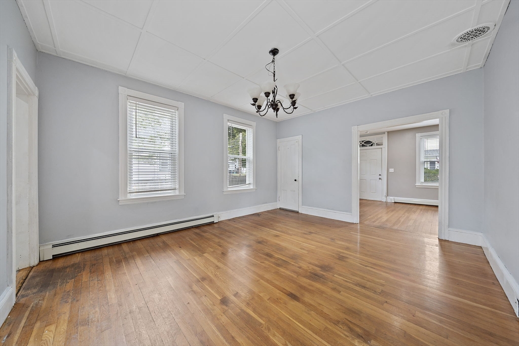 23 Reed Place Whitman, MA 02382 - Photo 11 of 35 a view of livingroom with window hardwood floor and window