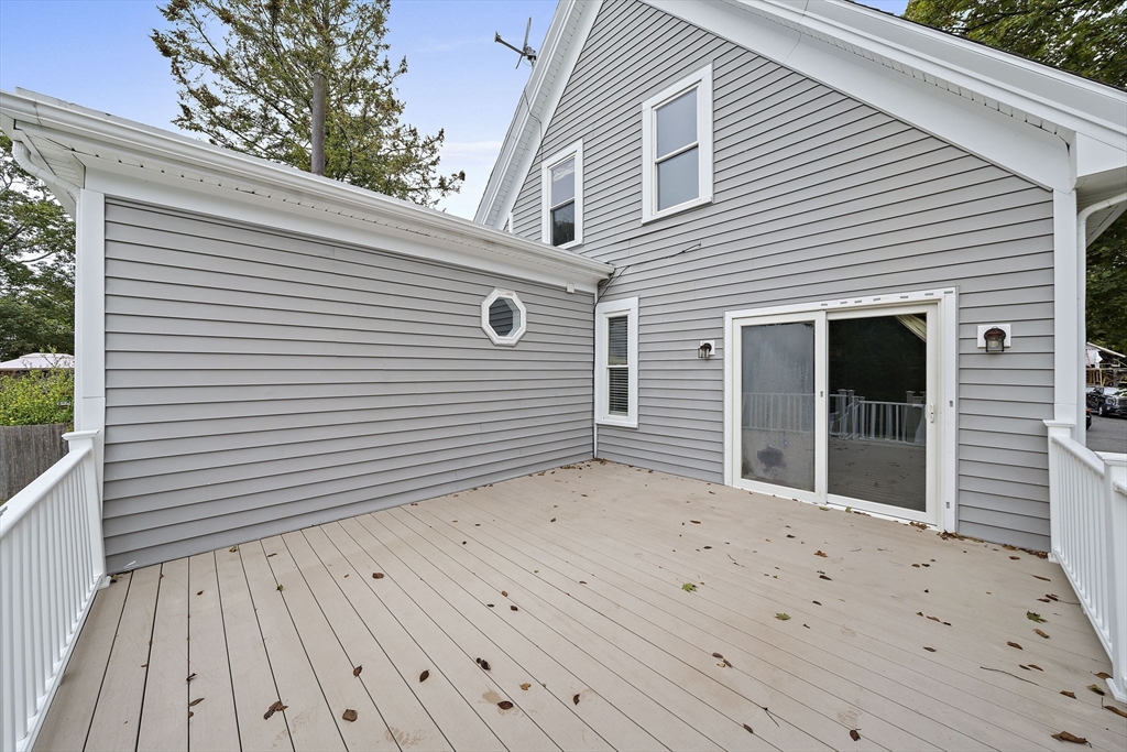 23 Reed Place Whitman, MA 02382 - Photo 31 of 35 a view of a house with a deck