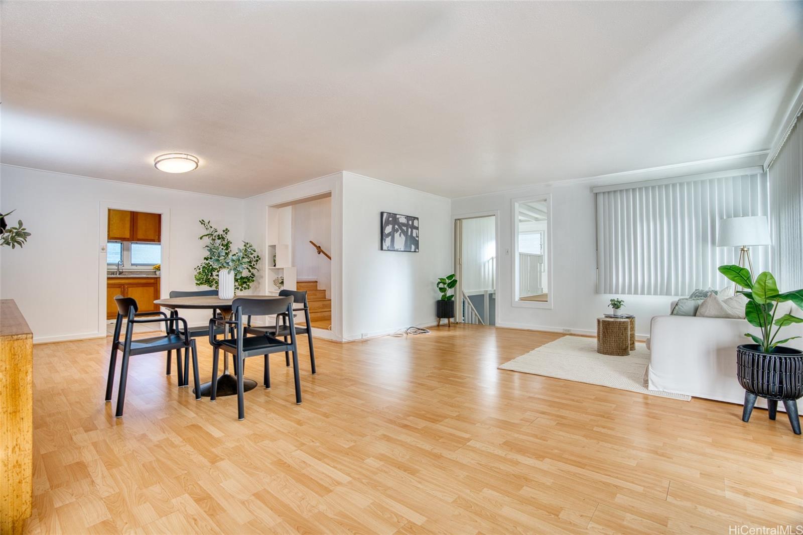 2959 Manoa Road Honolulu, HI 96822 - Photo 1 of 1 a view of a dining room with furniture and wooden floor