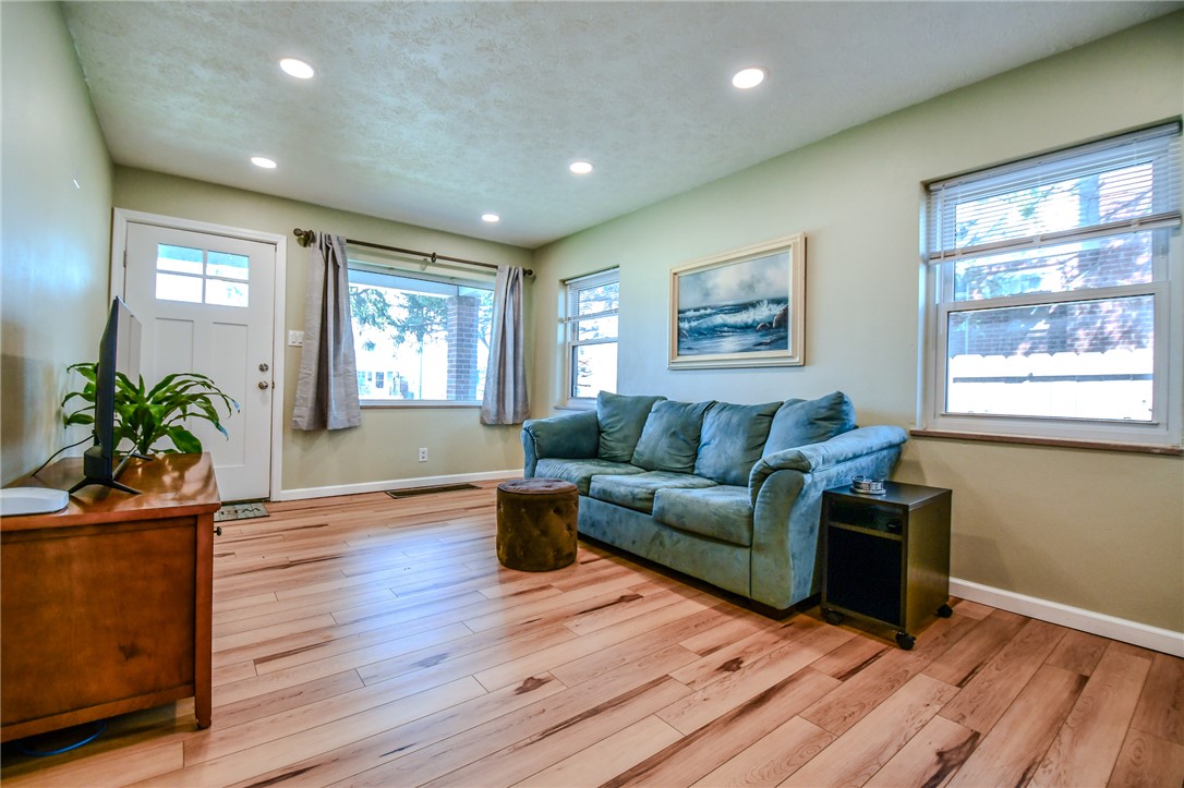 816 South Smithville Road Dayton, OH 45403 - Photo 6 of 33 This inviting living space features warm hardwood floors and abundant natural light.