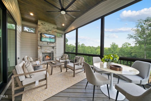 a view of porch with wooden floor in outdoor space