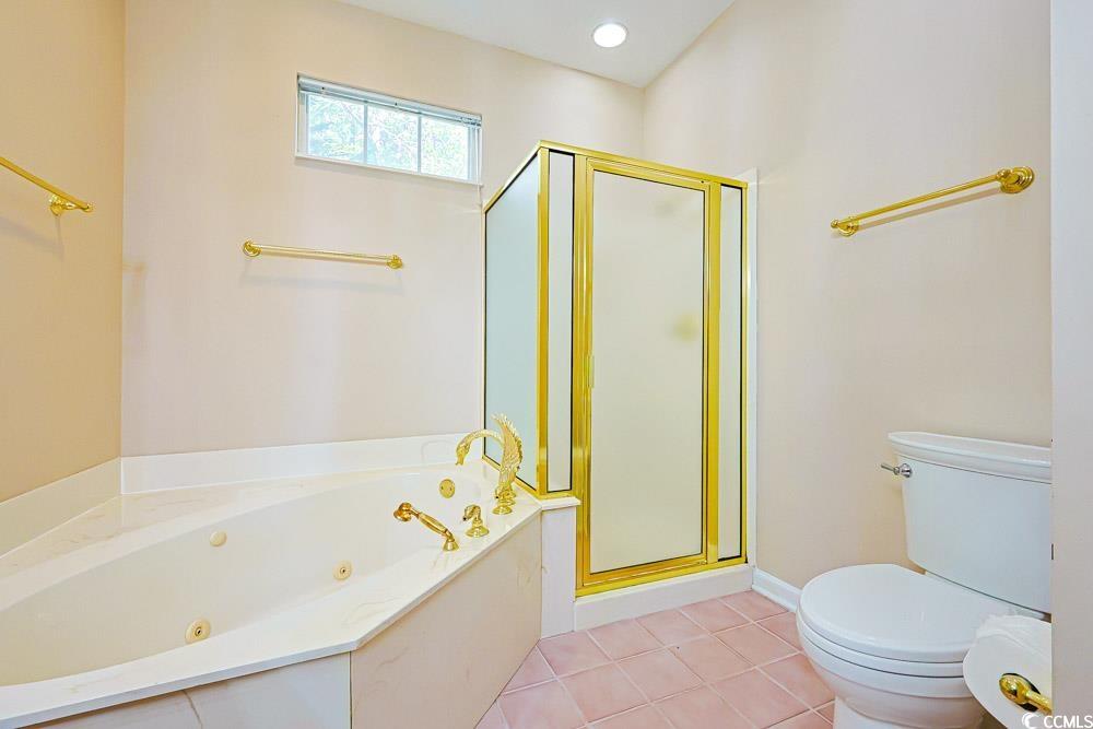 401 Pipers Lane, Unit 401 Myrtle Beach, SC 29575 - Photo 12 of 40 Full bath with a tub with jets, a shower stall, light tile patterned floors, and recessed lighting