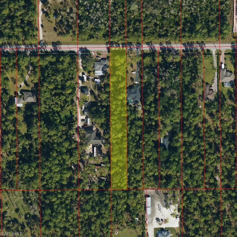 Aerial map of property and surrounding area featuring property boundaries highlighted