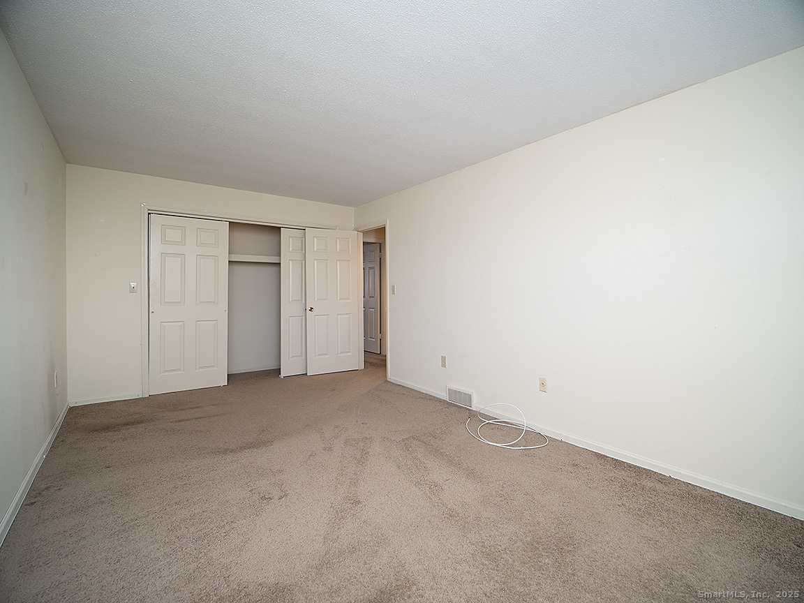 3989 Park Avenue, Unit 3989 Fairfield, CT 06825 - Photo 22 of 37 a view of an empty room