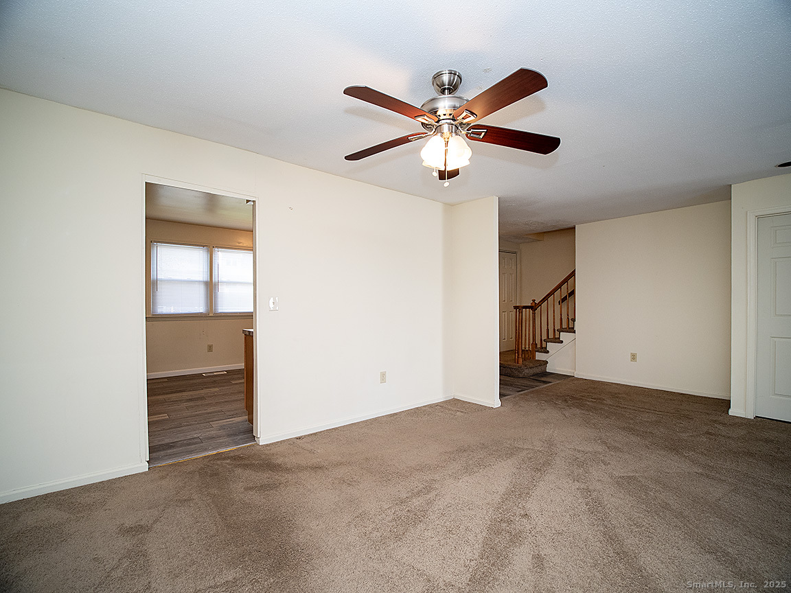 3989 Park Avenue, Unit 3989 Fairfield, CT 06825 - Photo 7 of 37 a view of an empty room and window