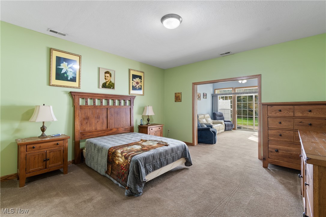 7030 Knight Avenue Northwest Canton, OH 44708 - Photo 14 of 26 Carpeted bedroom with a textured ceiling