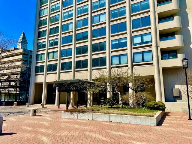 a view of lobby with furniture and large window