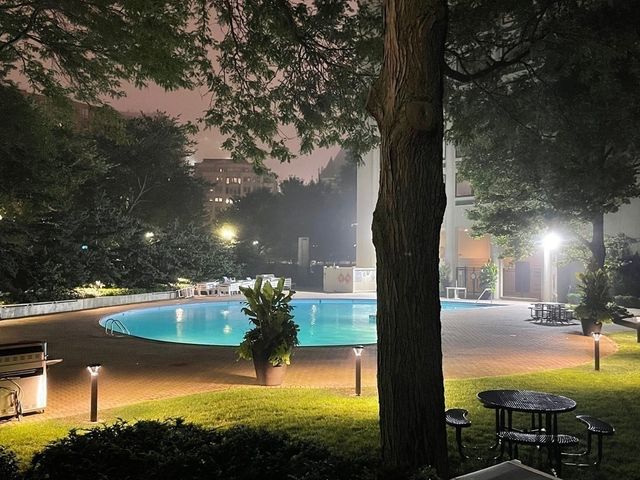 a view of an apartment with a garden