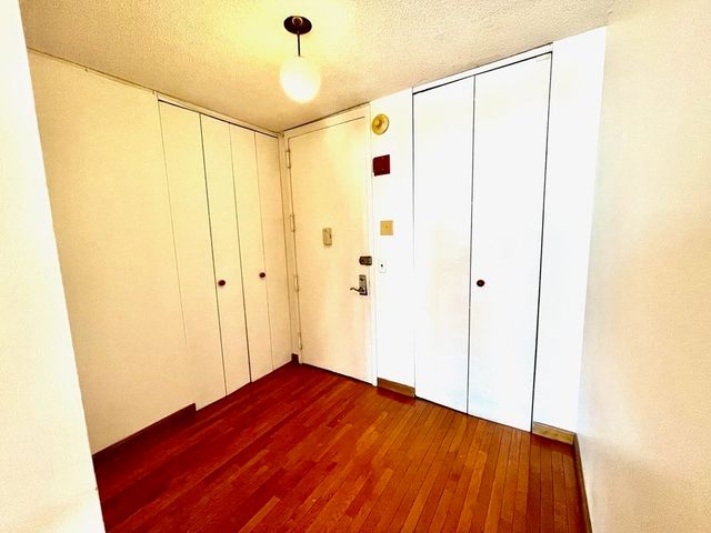 a kitchen with a stove and a microwave