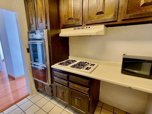 a view of ocean with tall building