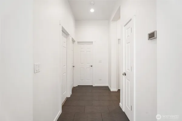 a bedroom with a bed and with furniture