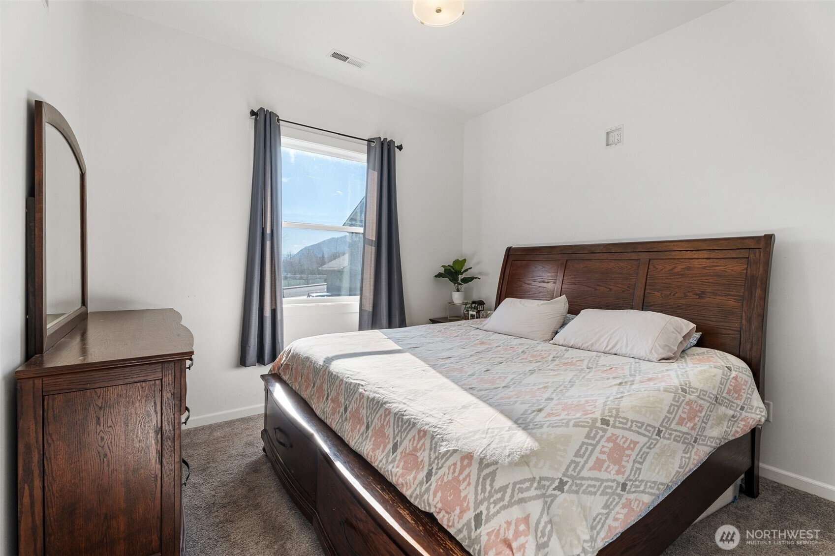 1038 Crest Loop Entiat, WA 98822 - Photo 18 of 40 a bedroom with a bed and with furniture