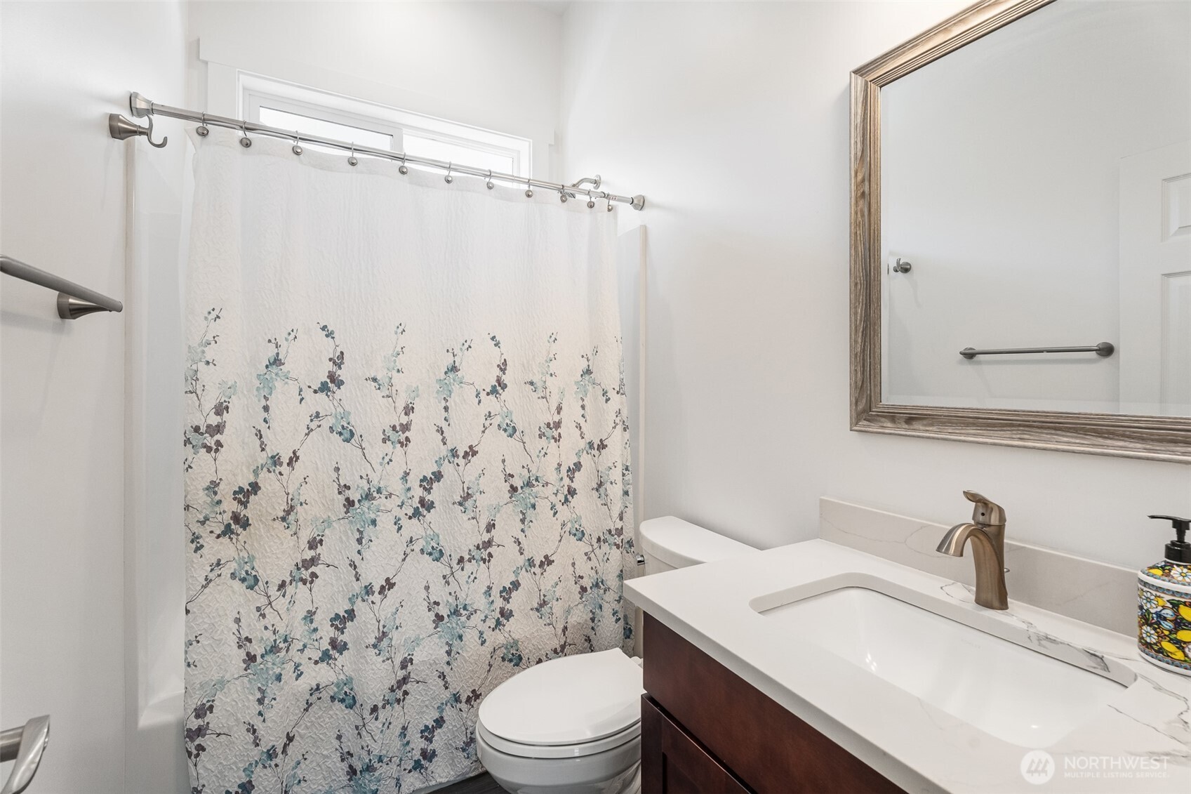1038 Crest Loop Entiat, WA 98822 - Photo 20 of 40 a bathroom with a sink toilet vanity and shower