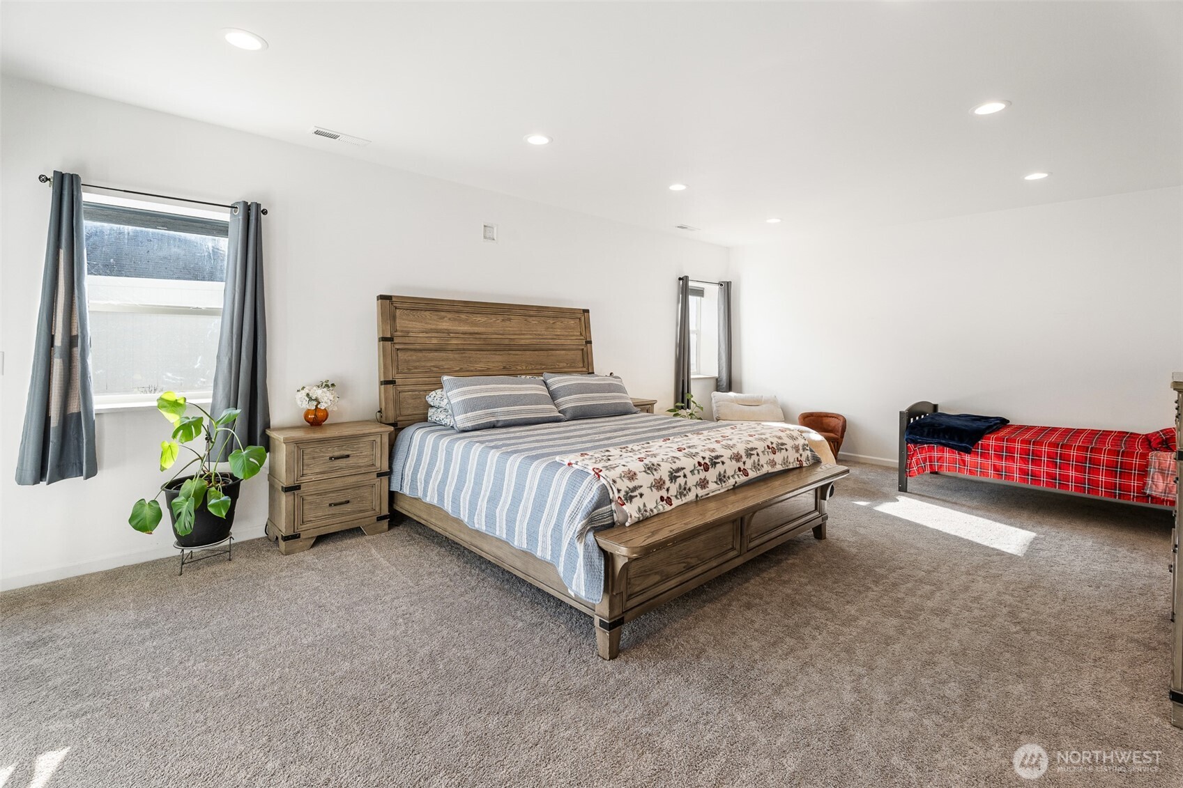 1038 Crest Loop Entiat, WA 98822 - Photo 25 of 40 a bedroom with a bed and a couch