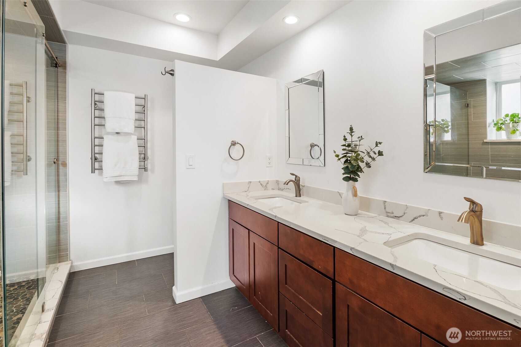1038 Crest Loop Entiat, WA 98822 - Photo 28 of 40 a bathroom with a double vanity sink and a mirror