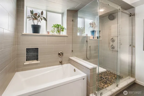 a utility room with sink dryer and washer