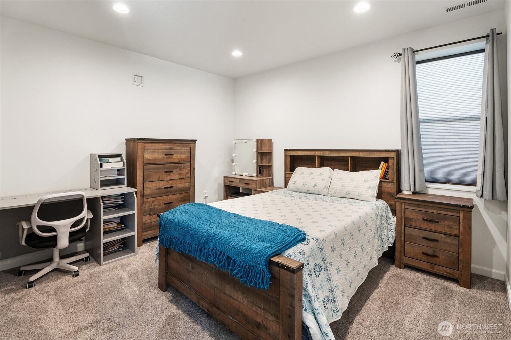 1038 Crest Loop Entiat, WA 98822 - Photo 32 of 40 a bedroom with a bed and a window