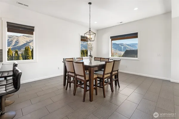 a view of a dining room kitchen and dining room
