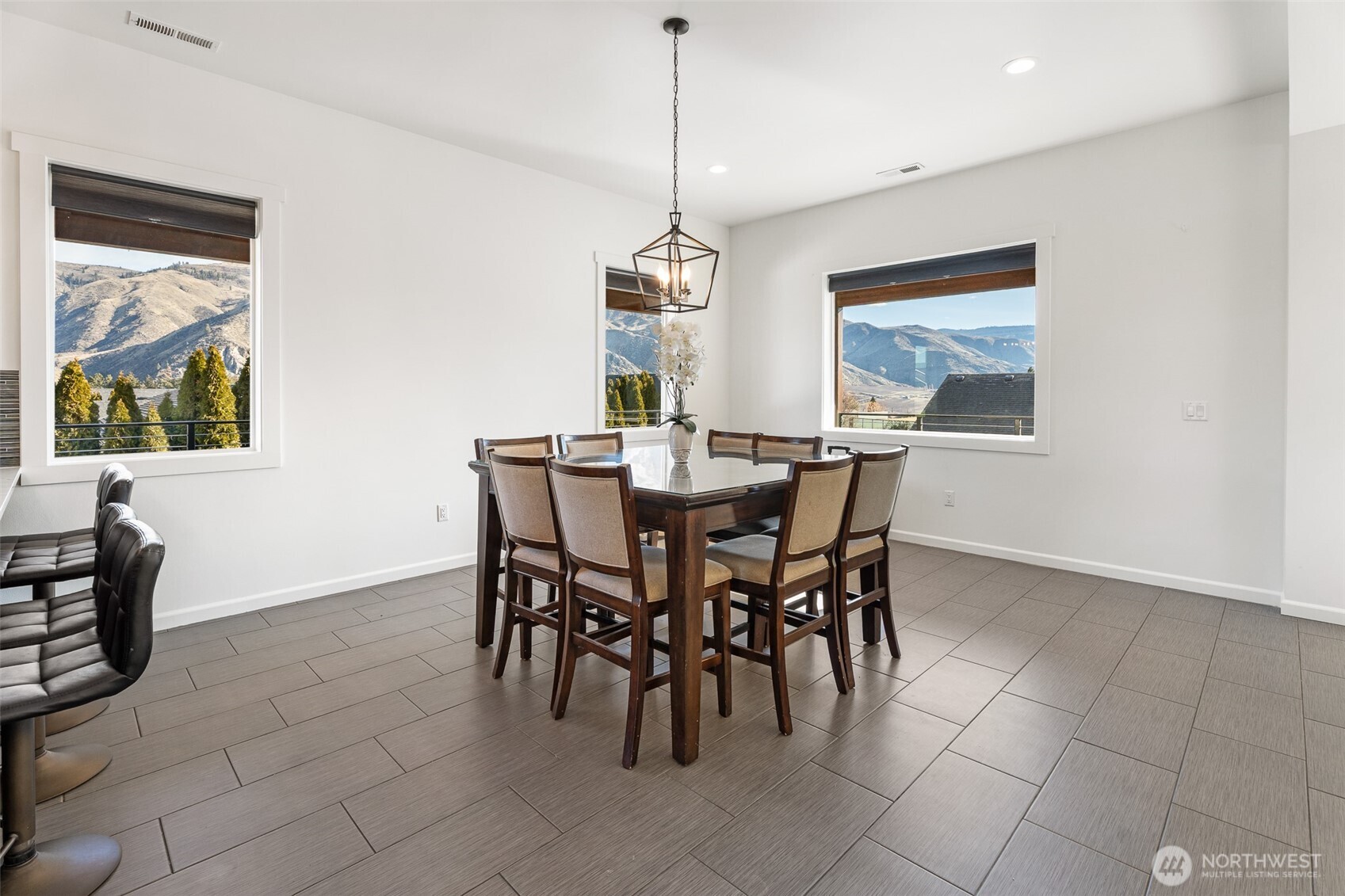 1038 Crest Loop Entiat, WA 98822 - Photo 9 of 40 a dining room with furniture and window