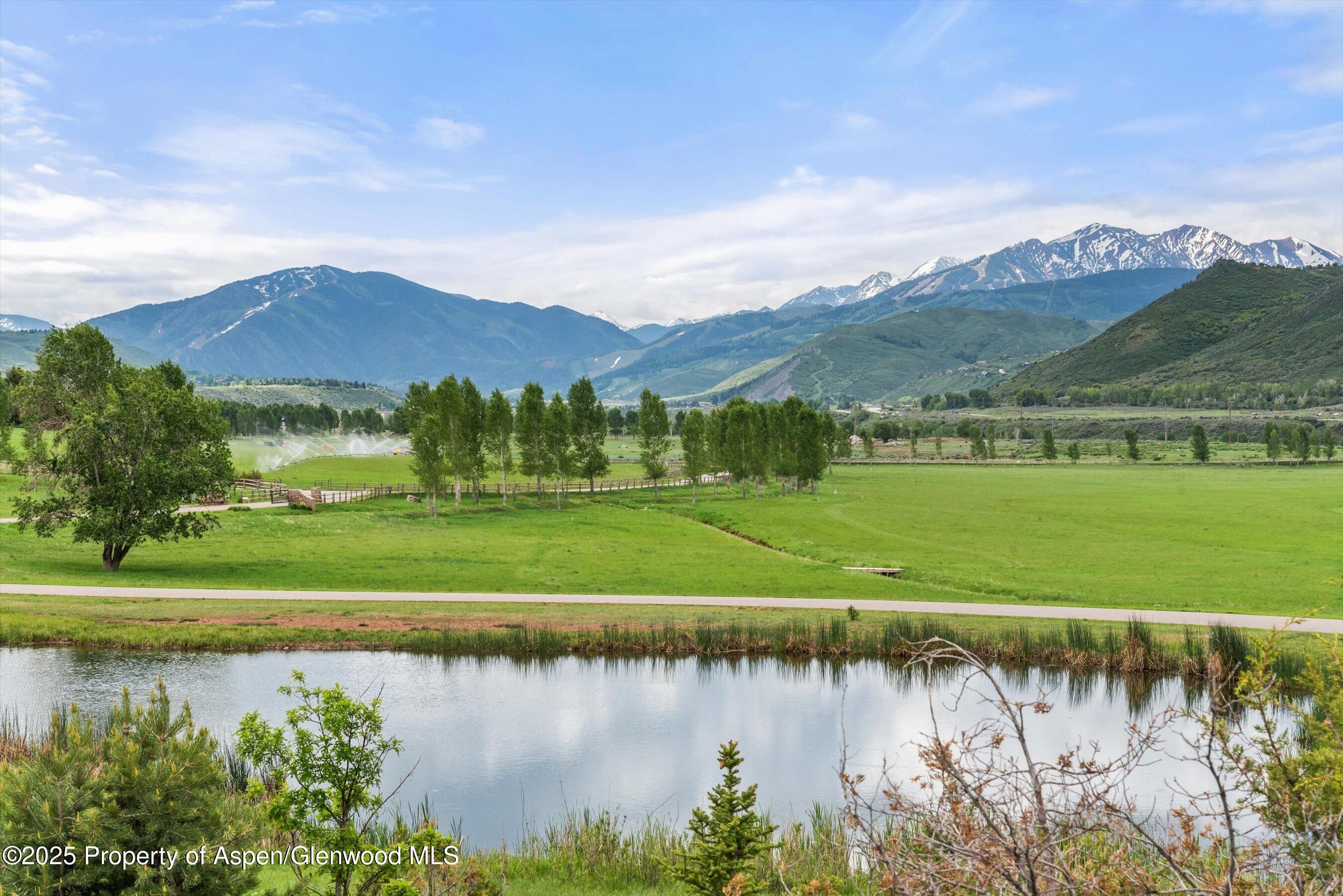 31 Aspen Valley Ranch Road Woody Creek, CO 81656 - Photo 51 of 63 Pond in Backyard