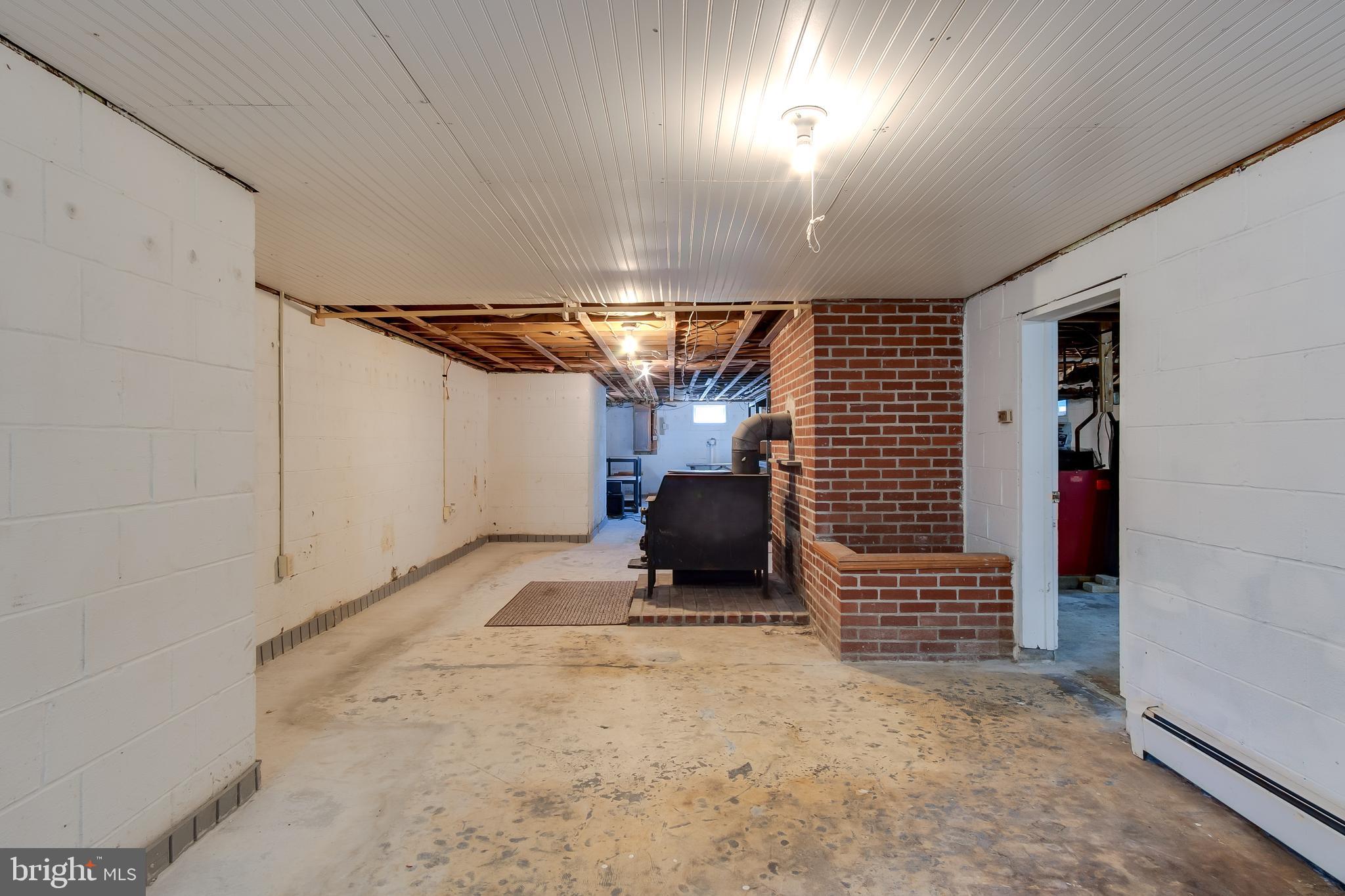 13516 Blairs Valley Road Clear Spring, MD 21722 - Photo 19 of 32 Wood Fireplace in basement