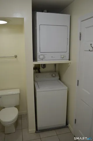 a close view of a utility room with a toilet sink