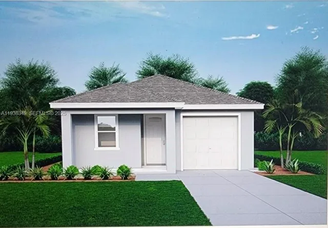 a front view of house with a garden