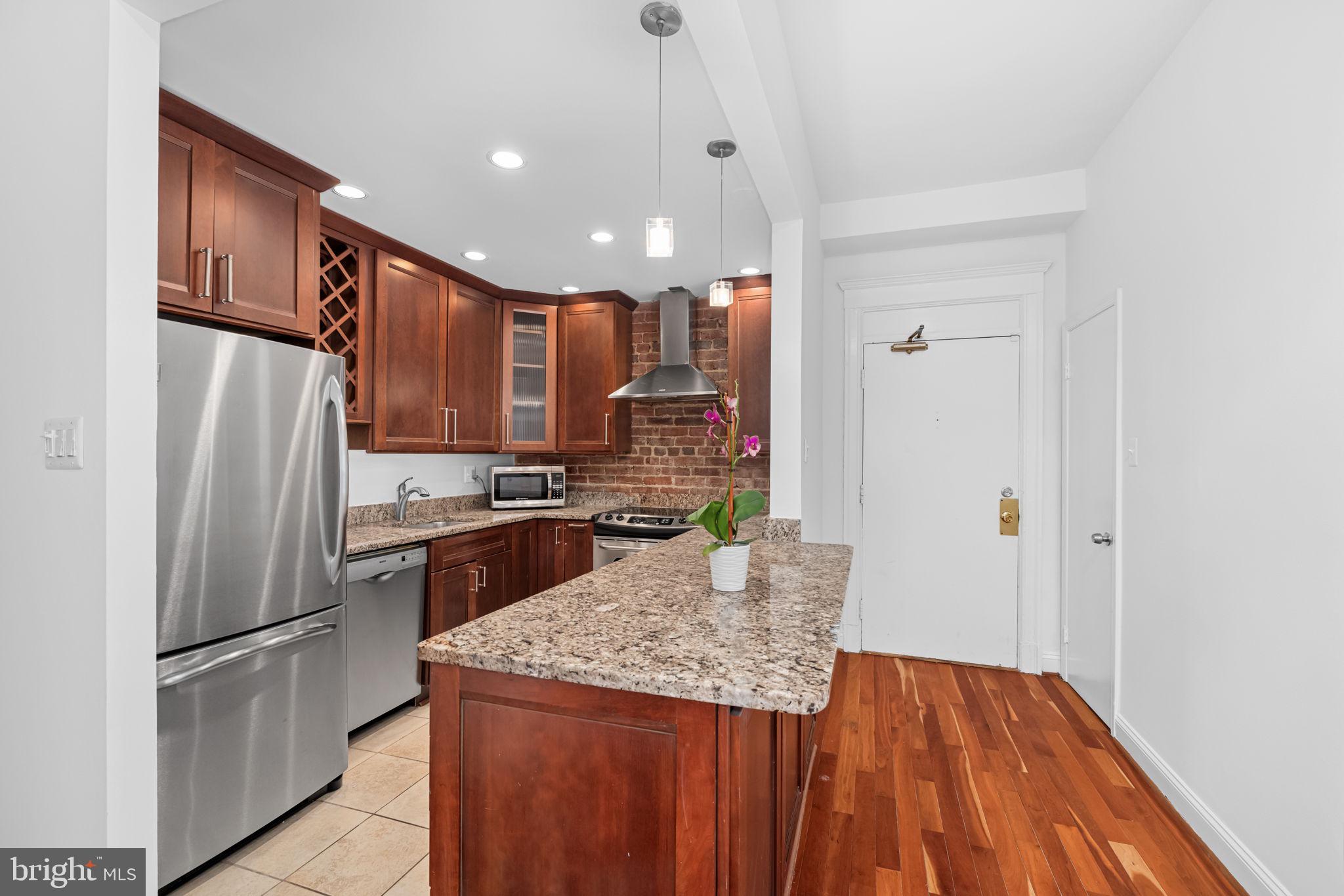 Kitchen with SS appliances, granite counter tops