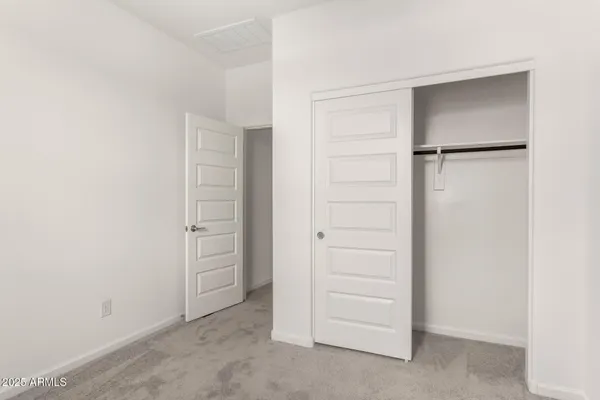 an empty room with closet
