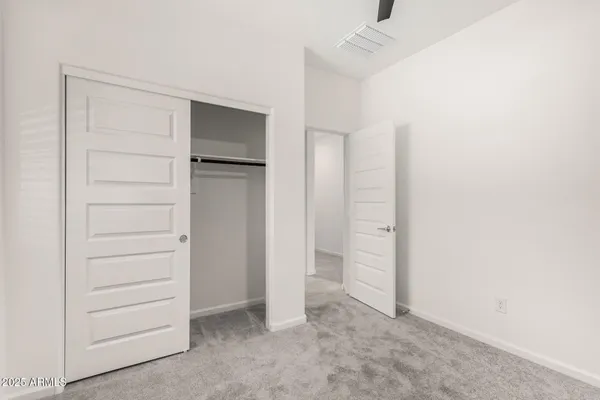 an empty room with closet