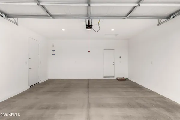 a view of a room with ceiling fan