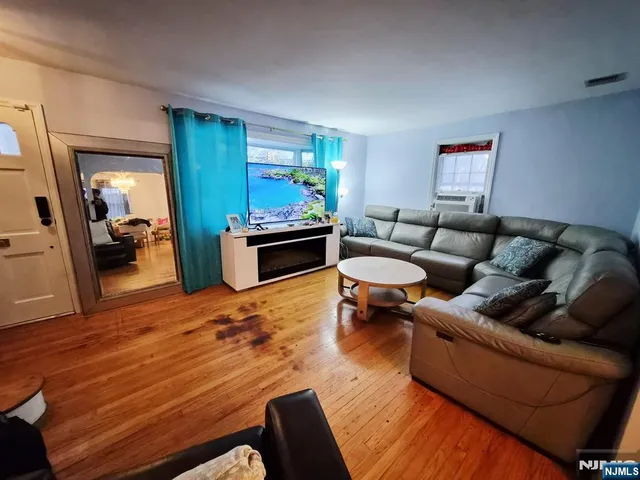 a living room with furniture and a couch