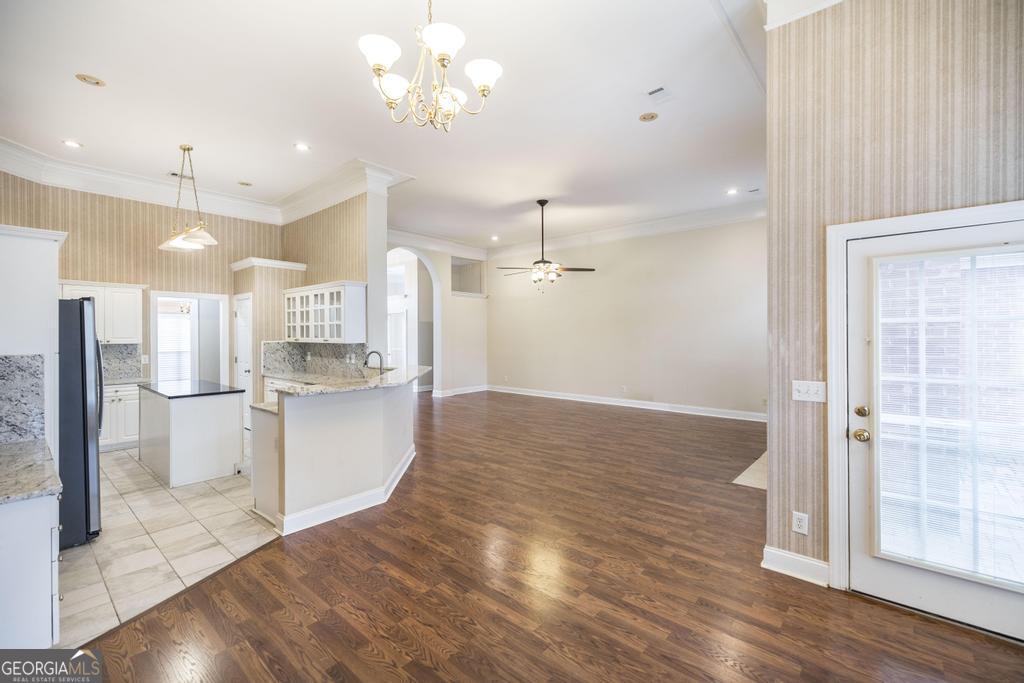 209 Trellis Walk Centerville, GA 31028 - Photo 18 of 38 a view of a kitchen with a refrigerator and a window