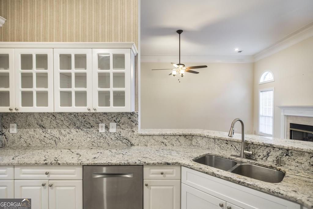 209 Trellis Walk Centerville, GA 31028 - Photo 20 of 38 a kitchen with a sink and cabinets