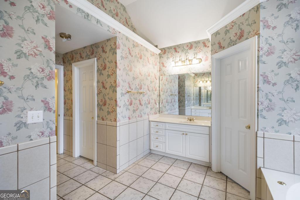 209 Trellis Walk Centerville, GA 31028 - Photo 26 of 38 a bathroom with a shower and a sink