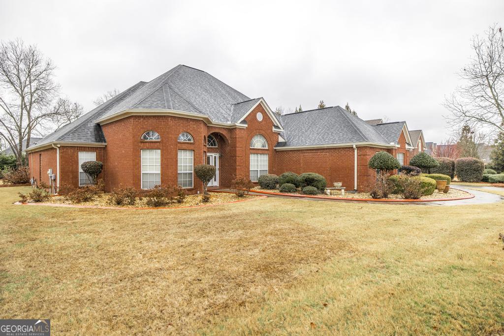 209 Trellis Walk Centerville, GA 31028 - Photo 3 of 38 a view of swimming pool and outside area of the house
