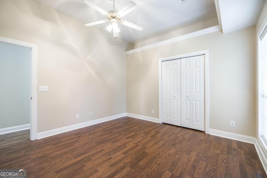 209 Trellis Walk Centerville, GA 31028 - Photo 32 of 38 a view of an empty room with wooden floor