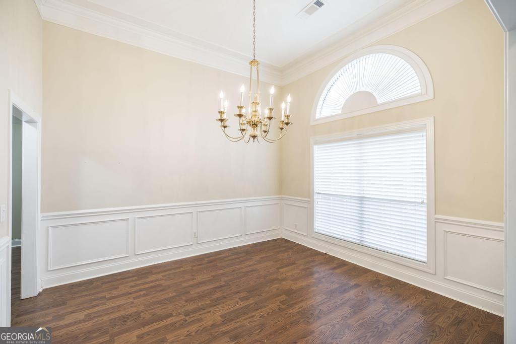 209 Trellis Walk Centerville, GA 31028 - Photo 7 of 38 wooden floor in an empty room with a window