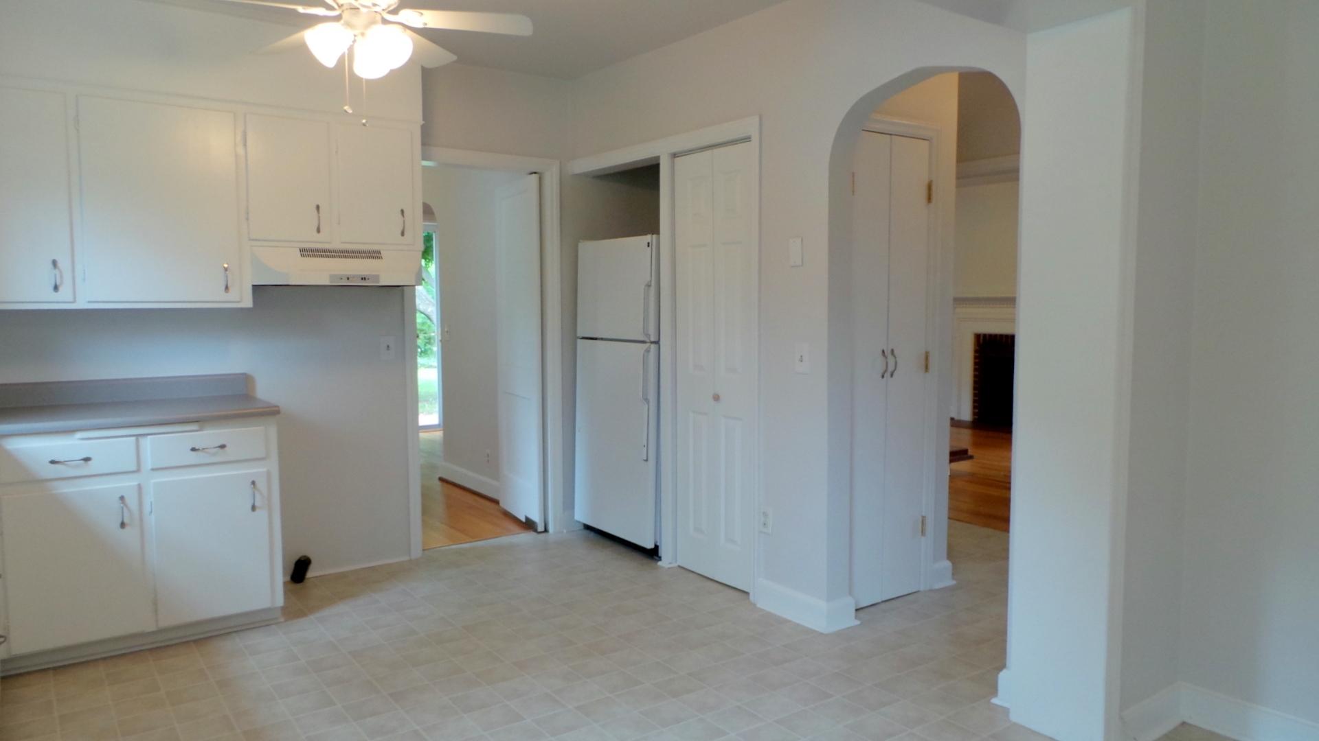 8659 Roanoke Road Elliston, VA 24087 - Photo 17 of 32 wooden floor in an empty room and a kitchen