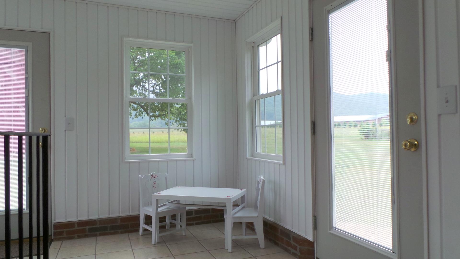 8659 Roanoke Road Elliston, VA 24087 - Photo 3 of 32 a view of a room that has a window and outside view