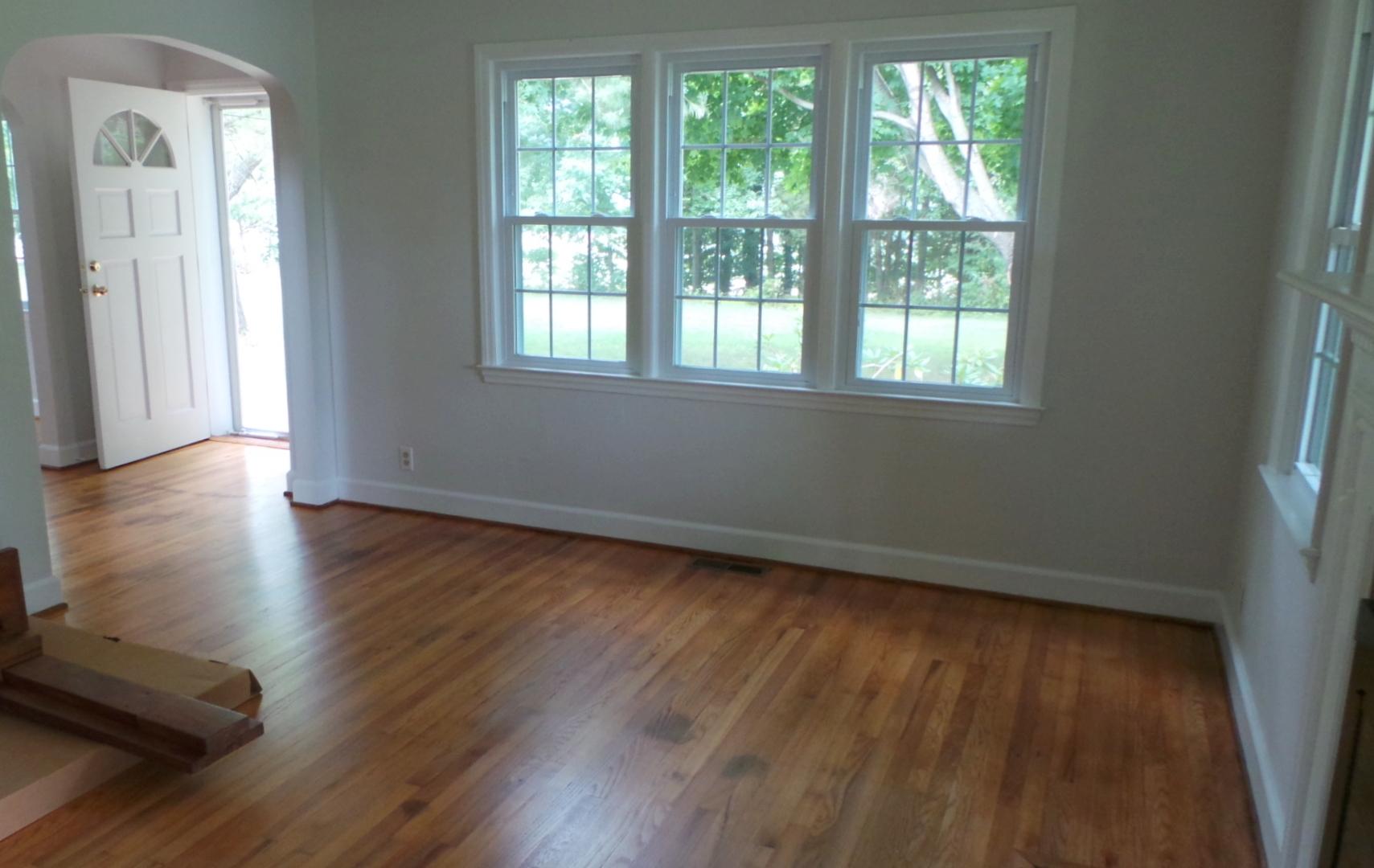 8659 Roanoke Road Elliston, VA 24087 - Photo 24 of 32 an empty room with wooden floor and windows
