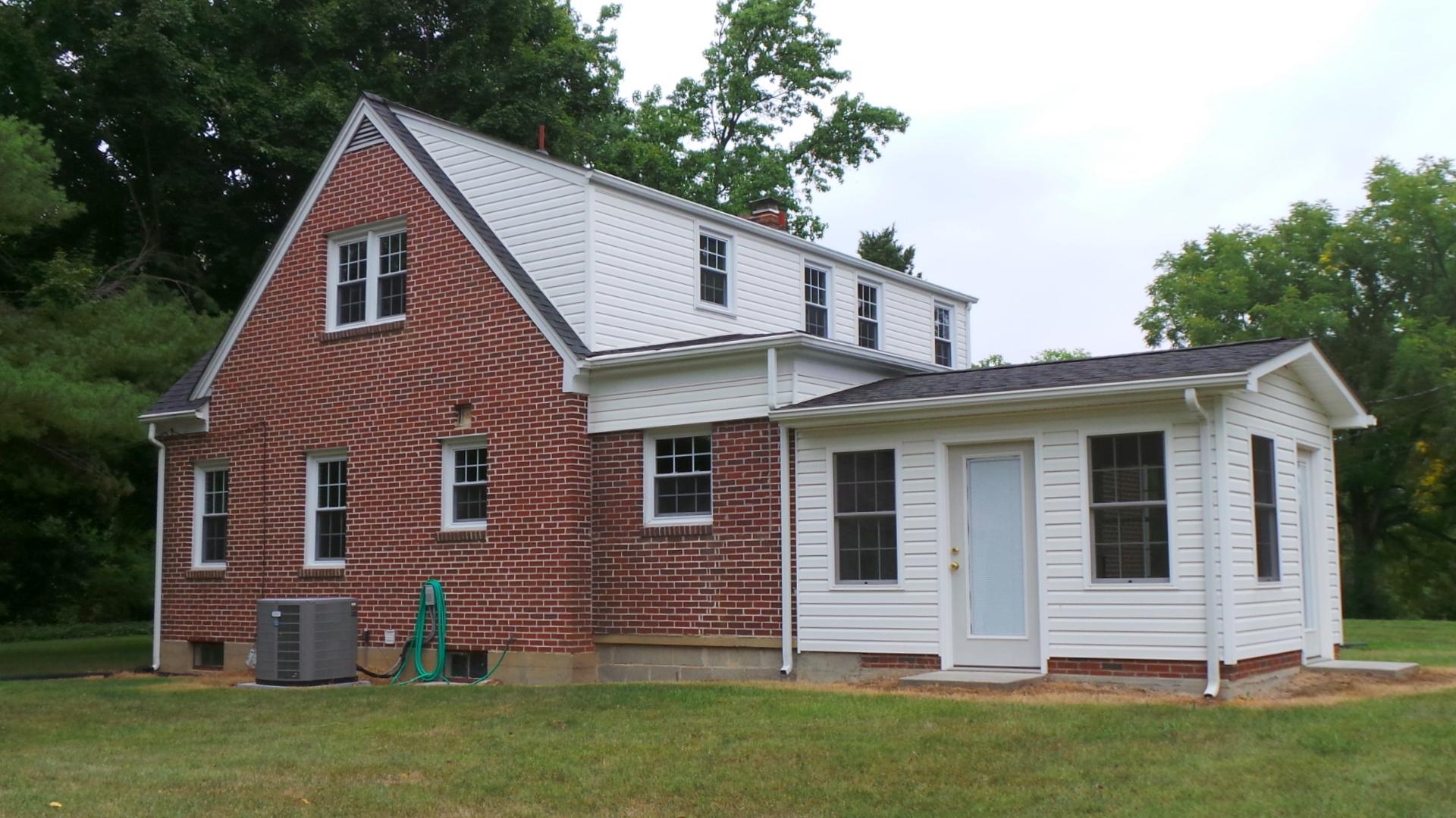 8659 Roanoke Road Elliston, VA 24087 - Photo 26 of 32 a front view of a house with a yard