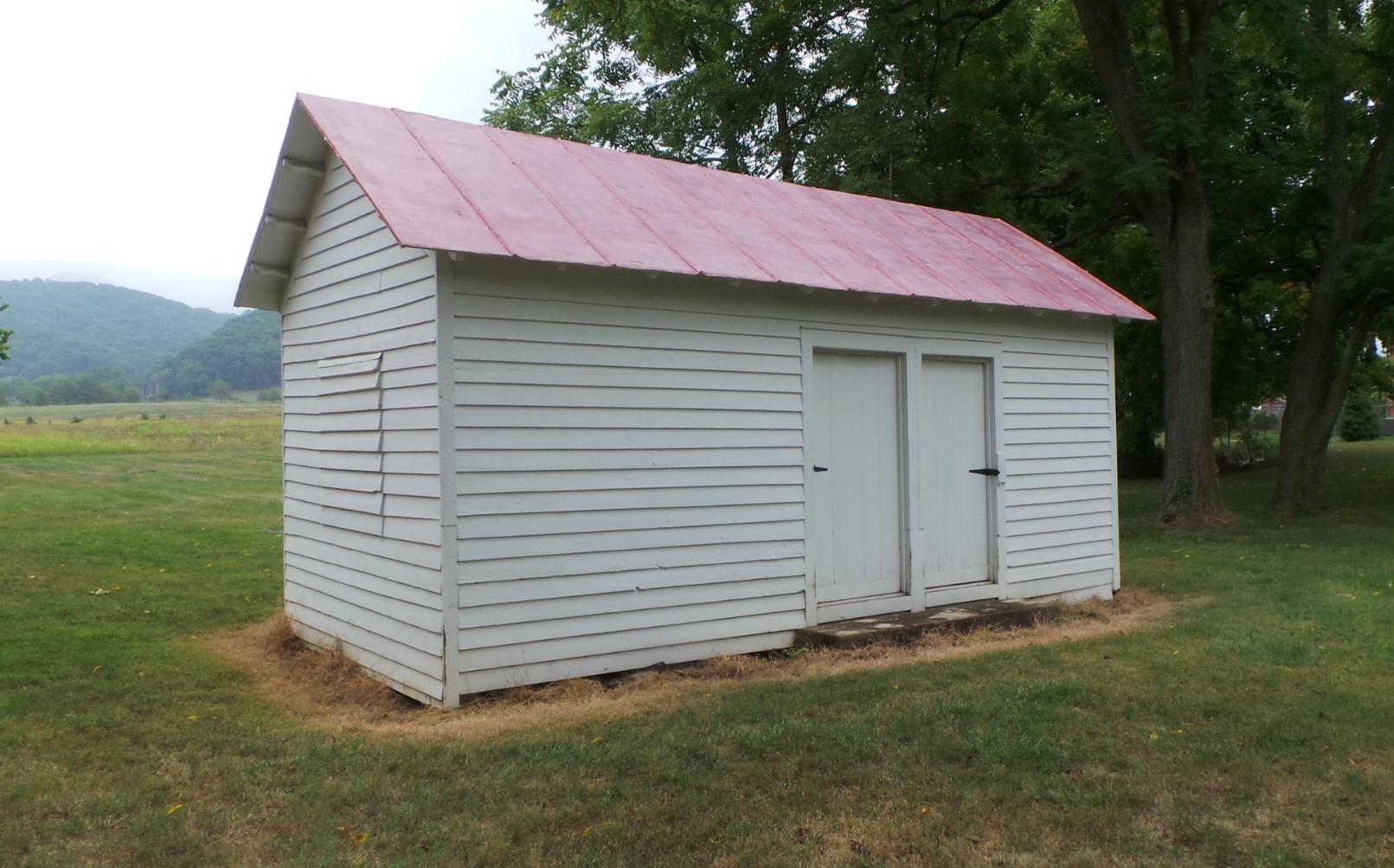 8659 Roanoke Road Elliston, VA 24087 - Photo 28 of 32 a view of a backyard with a garden