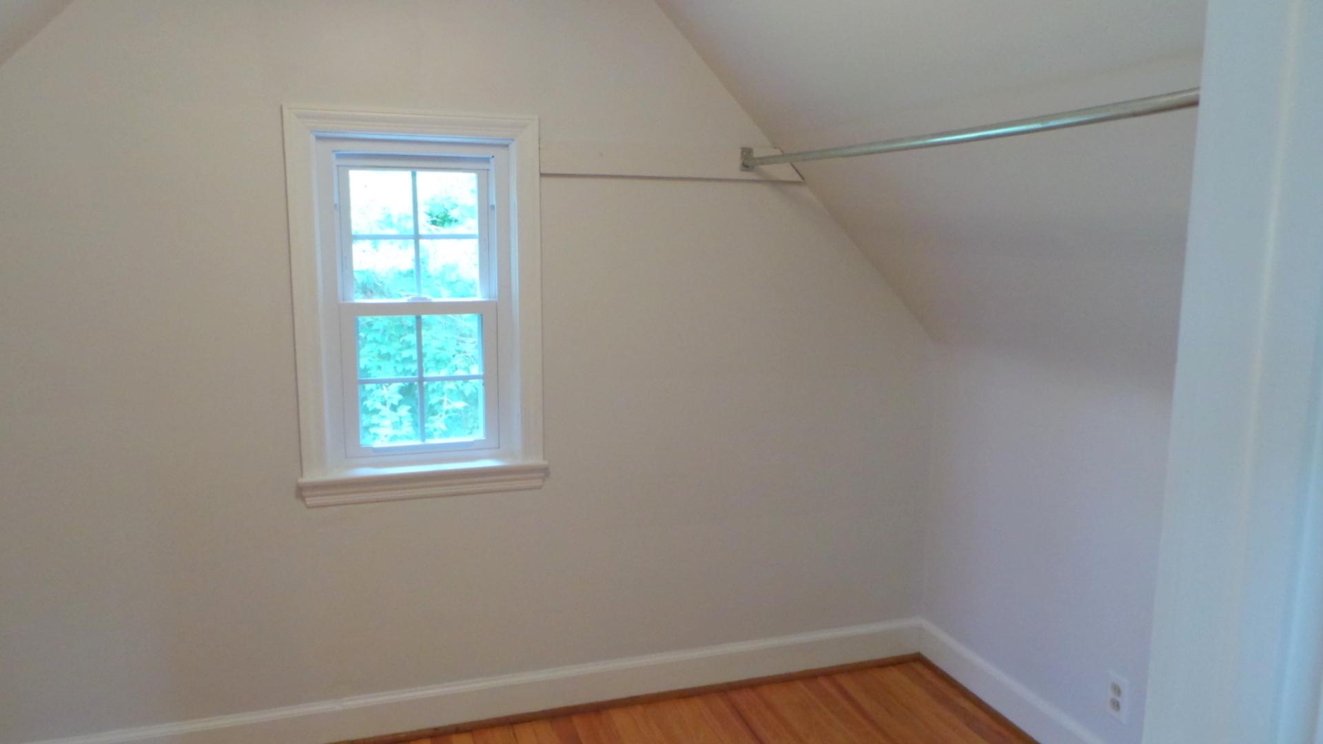 8659 Roanoke Road Elliston, VA 24087 - Photo 8 of 32 a view of a room with rack on the wall and a window