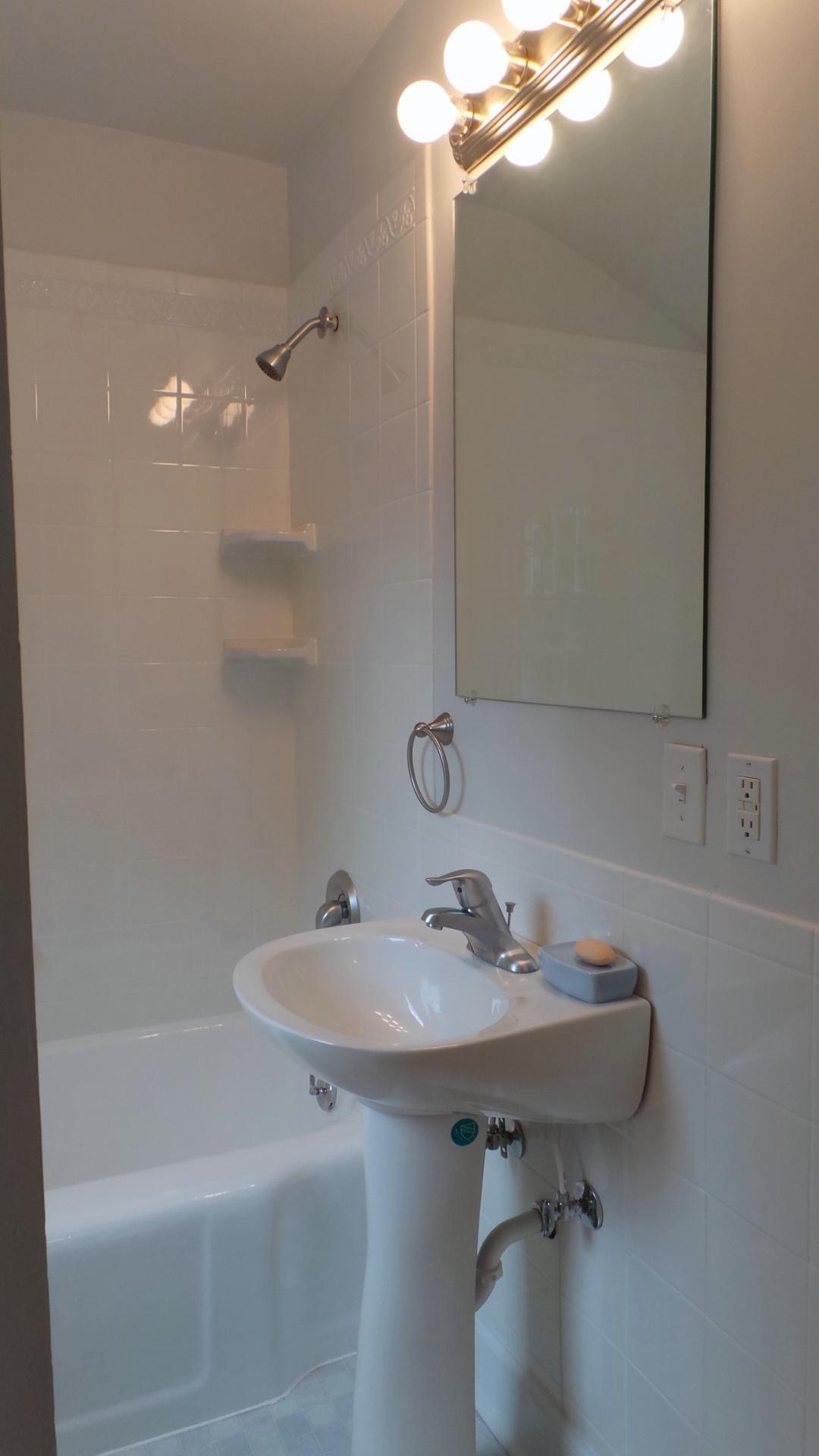8659 Roanoke Road Elliston, VA 24087 - Photo 10 of 32 a bathroom with a sink and a mirror