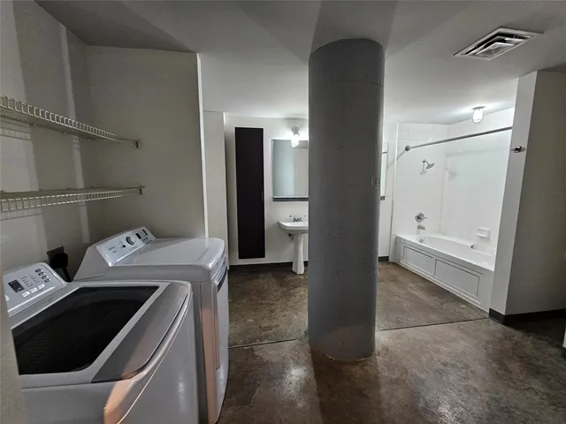 a utility room with dryer and washer