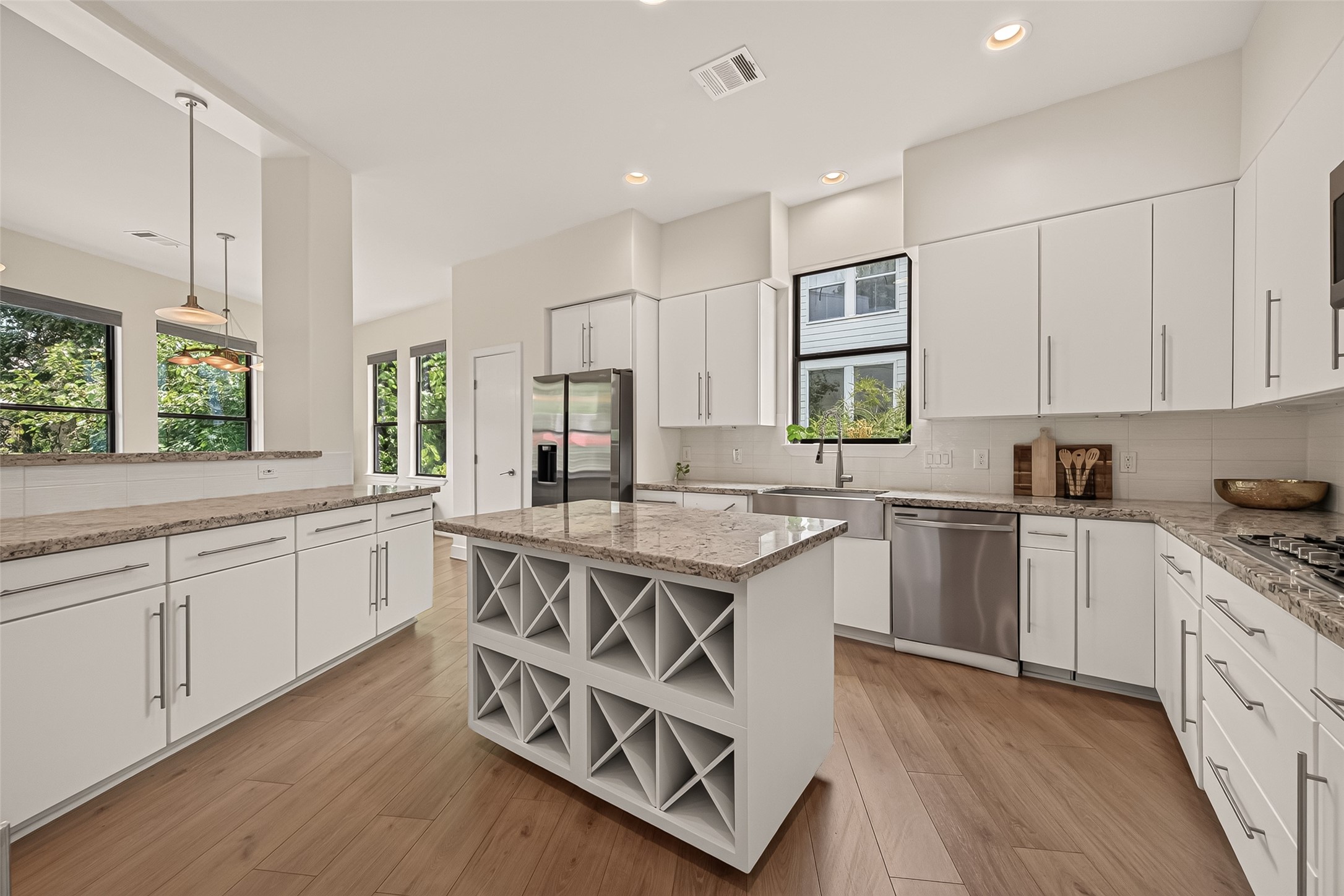 1767 Michigan Street Houston, TX 77006 - Photo 12 of 33 The island features built-in wine storage.