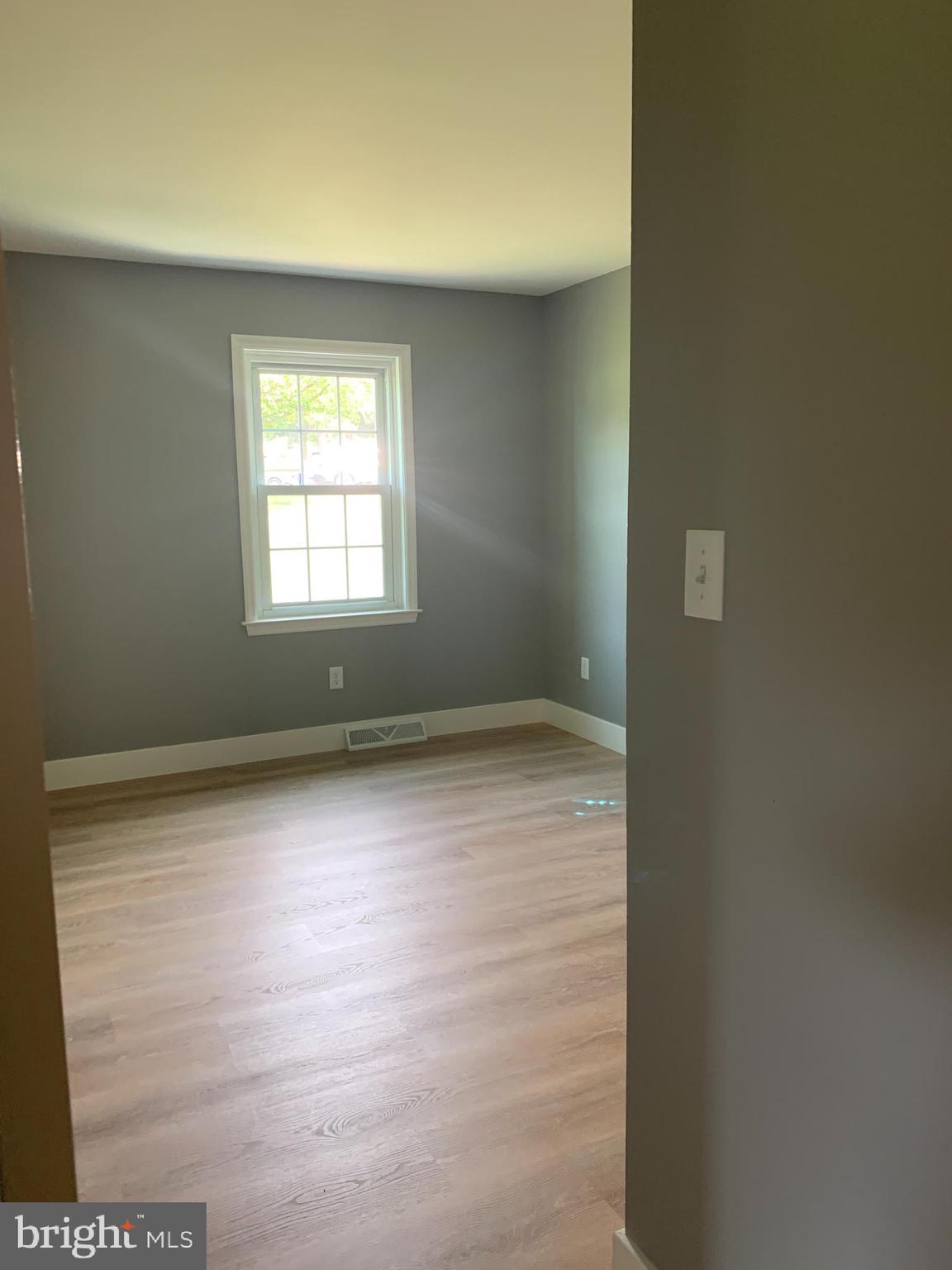 549 Hi View Drive Lititz, PA 17543 - Photo 14 of 42 a view of a room with wooden floor and window