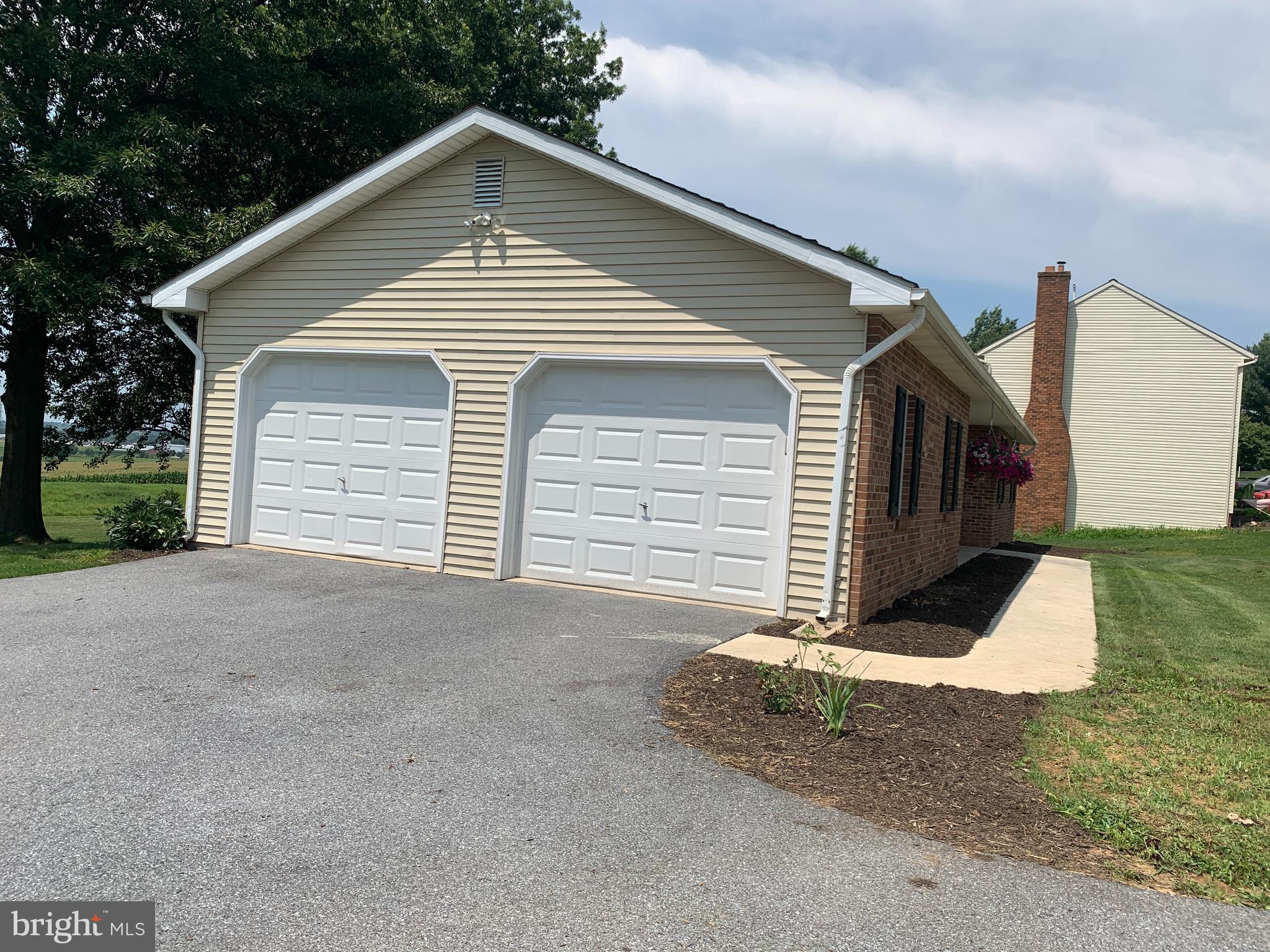 549 Hi View Drive Lititz, PA 17543 - Photo 3 of 42 a view of a house with a yard and garage
